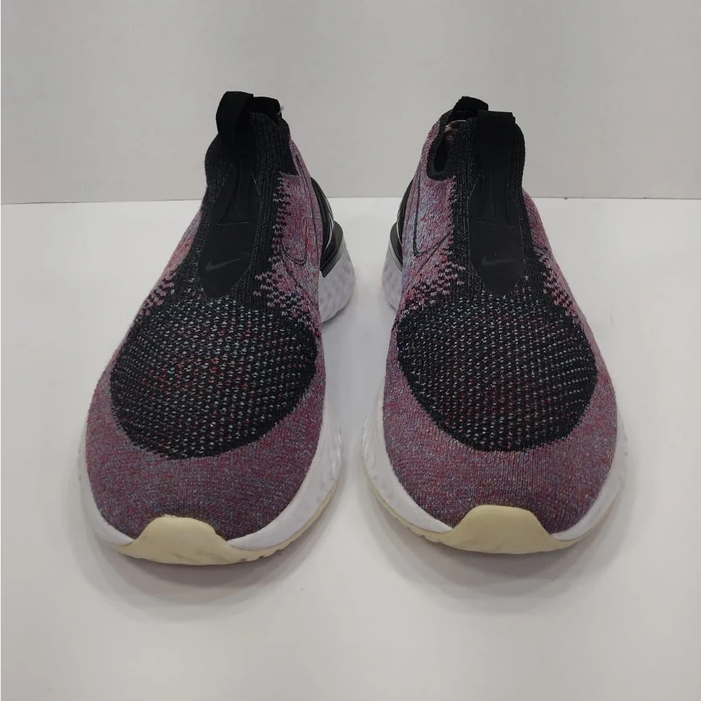 Nike Multicolor Flyknit Sneakers size 9.5 pre owned Exellent condition